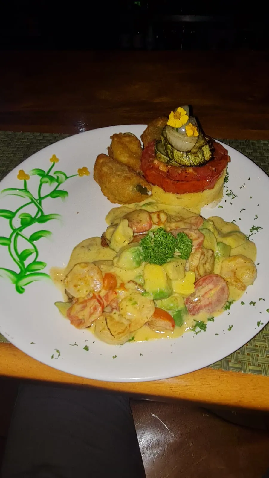 Grilled steak special served with traditional sides and Lake Arenal view